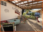 überdachter Freisitz - 85 m² großes Einfamilienhaus mit Friseursalon und 752 gepflegtem Grundstück!