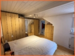 Schlafzimmer - Ehemaliger Winzerhof mit ELW, Charme und unzähligen Möglichkeiten im Herzen von Langenlonsheim
