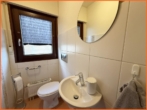 Gäste WC - Charmantes Einfamilienhaus mit Wellnessbereich, großem Garten und Weinbergblick!