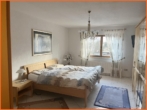 Schlafzimmer 1 - Naturnahes Wohnen mit viel Platz und Gestaltungsraum in idyllischer Weinbaugemeinde!
