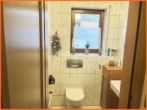 Gäste WC - Naturnahes Wohnen mit viel Platz und Gestaltungsraum in idyllischer Weinbaugemeinde!