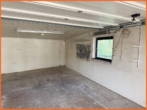 Garage - Ruhiges Familienidyll mit Potenzial – Zuhause in grüner Harmonie