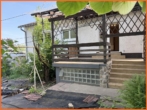 Gartenseite - Ruhiges Familienidyll mit Potenzial – Zuhause in grüner Harmonie