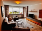 Wohnzimmer - GELEGENHEIT – 2-Zimmer Wohnung, Toprenoviert, mit Einbauküche und PKW-Abstellplatz