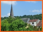 Ansicht Rückseite - VERKAUFT 4 Zimmer-Maisonette mit Terrassen, Garten und Finanzierungshilfe durch gut vermieteten Laden.