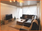 Wohnen - VERKAUFT 4 Zimmer-Maisonette mit Terrassen, Garten und Finanzierungshilfe durch gut vermieteten Laden.