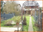 Garten - VERKAUFT 4 Zimmer-Maisonette mit Terrassen, Garten und Finanzierungshilfe durch gut vermieteten Laden.