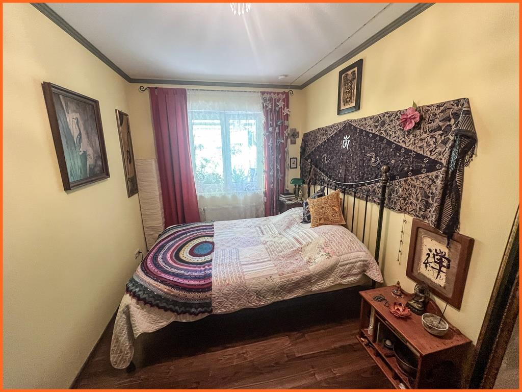 Attraktive Wohnung mit eigenem Gartenparadies und großzügiger Sonnen-Terrasse in Waldalgesheim - Zimmer 1 (10235)