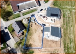 Luftaufnahme - Herrlich gelegenes Baugrundstück, ruhige Lage aber fußläufig zu Schule und Kindergarten!