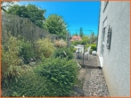Seitliche Terrasse - Erfüllen Sie sich Ihren Wohntraum: gepflegte 3 Zimmer-Wohnung mit Garten und nur 2 Parteien!