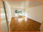 Wohnzimmer mit Balkon - RESERVIERT!!! Top geschnittene Eigentumswohnung in begehrter Lage von Wiesbaden Schierstein.