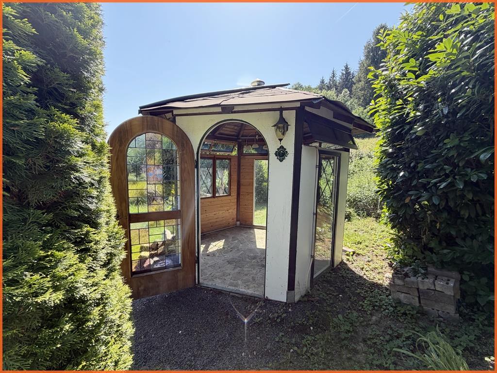 Haus in sonniger Grünblicklage und wohnlich gestalteter Garage mit Nutzungsvielfalt - Gartenidyll (10270)