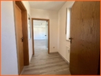 Flur - Traumhafte 2-Zimmer-Wohnung mit Balkon in zentraler Lage und Tiefgaragenstellplatz